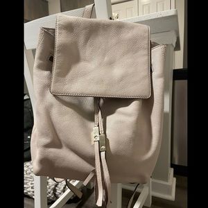 Lightly used Kate Spade bone leather flap backpack